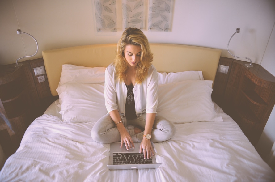 Woman using computer bitcookie 